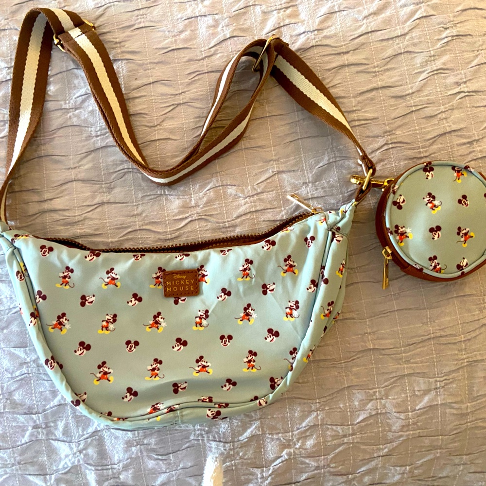 Disney light aqua Blue Crossbody Bag with change pouch. NWOT